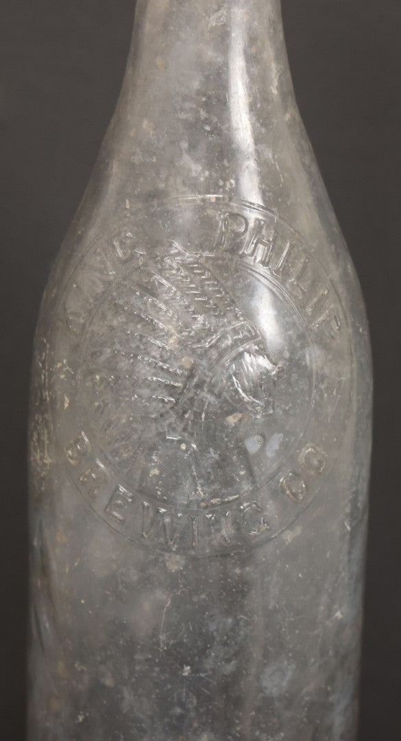 Lot 044 - Antique King Phillip Brewing Co. Clear Glass Bottle, With Native American Chief Motif Logo, Fall River, Massachusetts, 9-1/8" Height