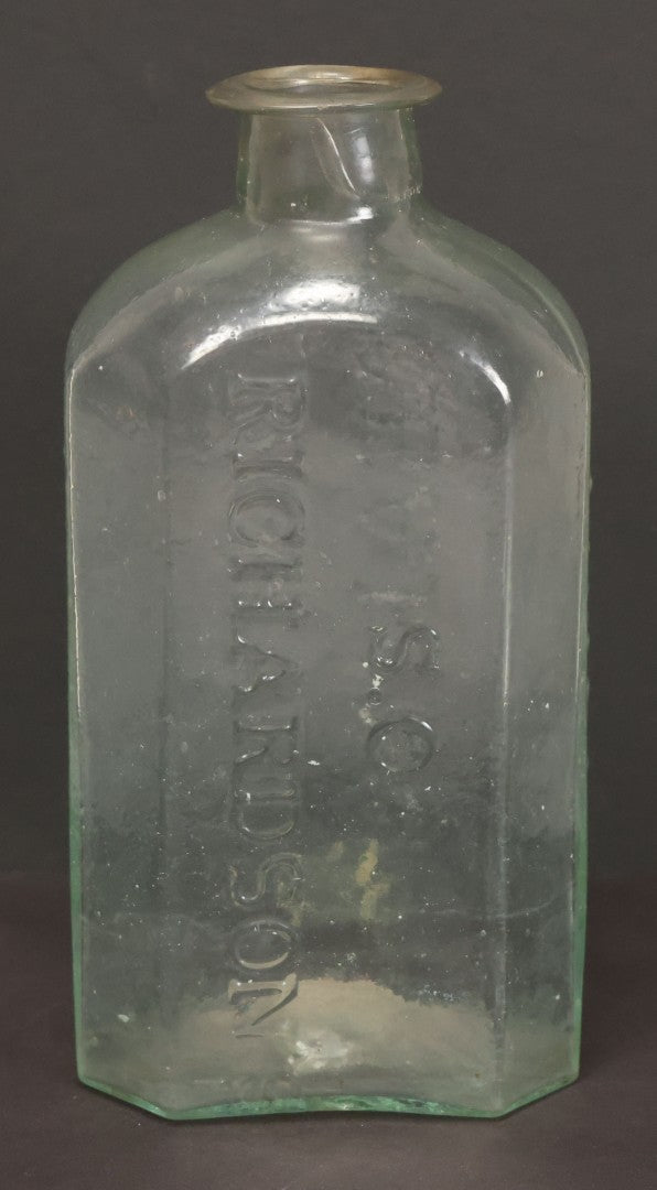 Lot 045 - Antique Hand Blown S.O. Richardson Bitters Green Tinted Clear Glass Bottle With Pontil, South Reading, Massachusetts, 6-1/2" Height