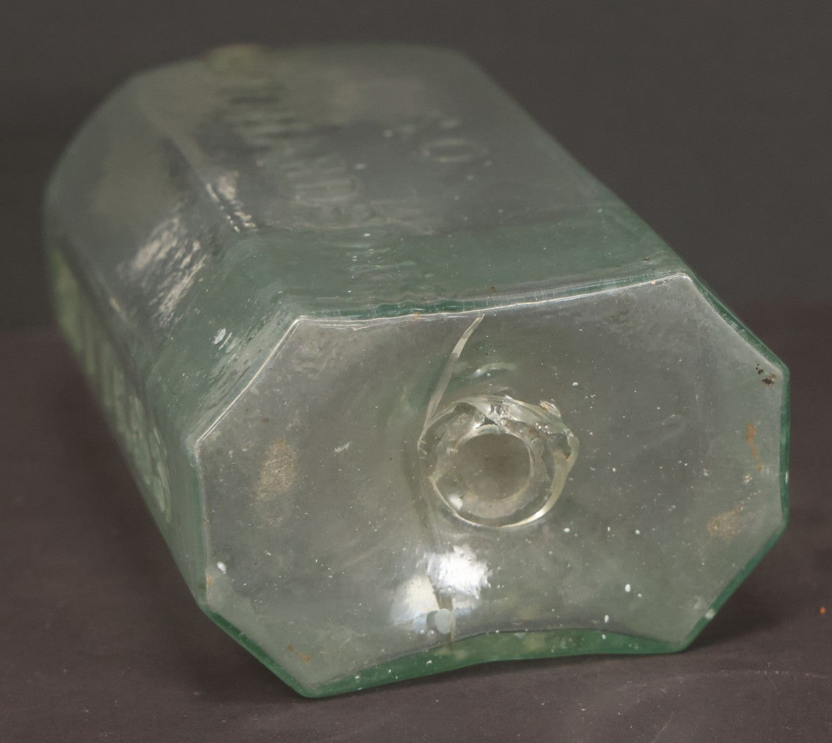 Lot 045 - Antique Hand Blown S.O. Richardson Bitters Green Tinted Clear Glass Bottle With Pontil, South Reading, Massachusetts, 6-1/2" Height