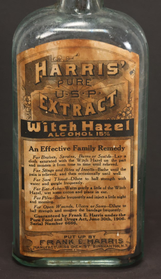 Lot 047 - Antique Harris' Pure Extract Witch Hazel Blue Tinted Clear Glass Bottle With Paper Label, Put Up By Frank E. Harris, Manufacturing Chemist, Binghamton, New York, 6-7/8" Height
