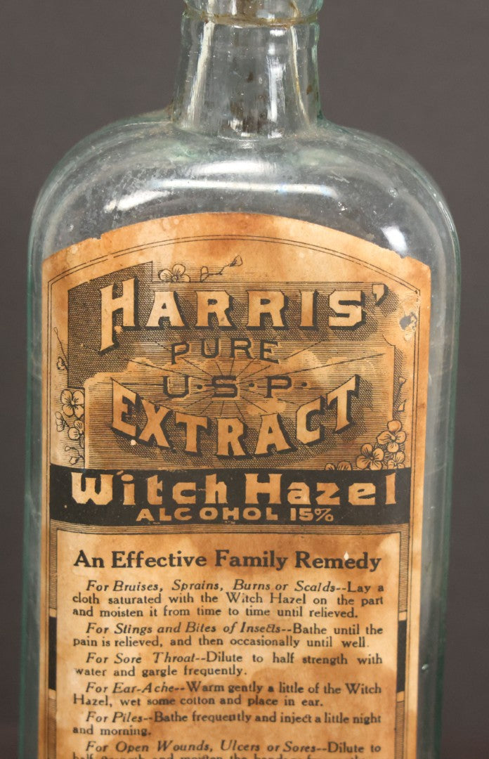 Lot 047 - Antique Harris' Pure Extract Witch Hazel Blue Tinted Clear Glass Bottle With Paper Label, Put Up By Frank E. Harris, Manufacturing Chemist, Binghamton, New York, 6-7/8" Height