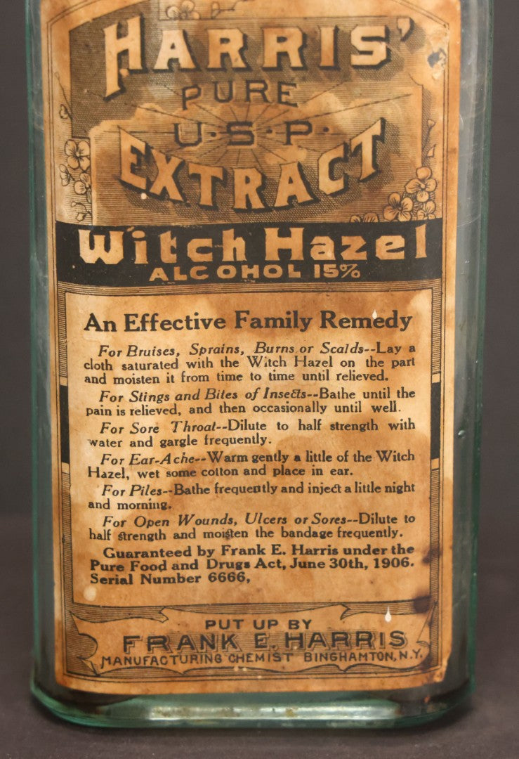 Lot 047 - Antique Harris' Pure Extract Witch Hazel Blue Tinted Clear Glass Bottle With Paper Label, Put Up By Frank E. Harris, Manufacturing Chemist, Binghamton, New York, 6-7/8" Height