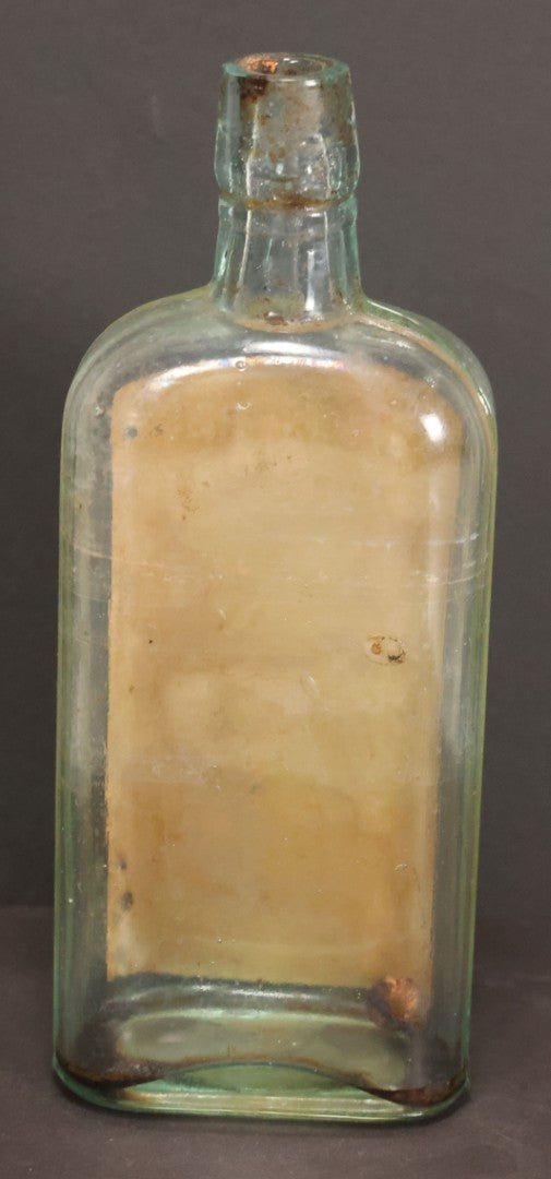 Lot 047 - Antique Harris' Pure Extract Witch Hazel Blue Tinted Clear Glass Bottle With Paper Label, Put Up By Frank E. Harris, Manufacturing Chemist, Binghamton, New York, 6-7/8" Height