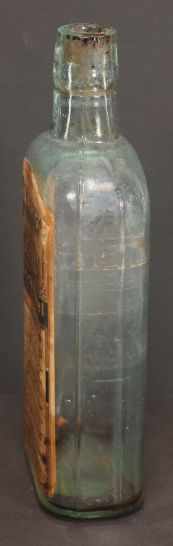 Lot 047 - Antique Harris' Pure Extract Witch Hazel Blue Tinted Clear Glass Bottle With Paper Label, Put Up By Frank E. Harris, Manufacturing Chemist, Binghamton, New York, 6-7/8" Height