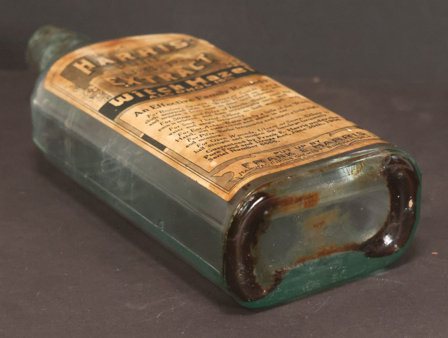 Lot 047 - Antique Harris' Pure Extract Witch Hazel Blue Tinted Clear Glass Bottle With Paper Label, Put Up By Frank E. Harris, Manufacturing Chemist, Binghamton, New York, 6-7/8" Height