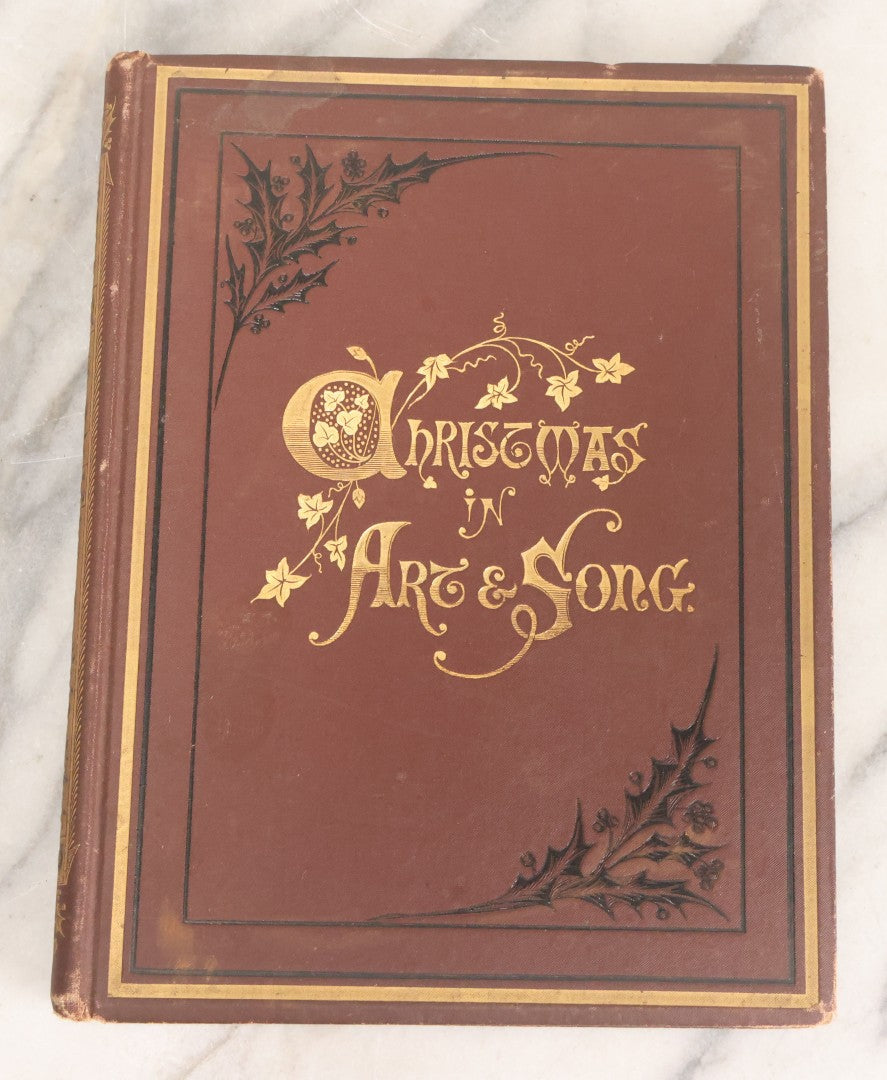 Lot 050 - "Christmas In Art & Song" Antique Book With 40+ Illustrations, Many Full Page Plates, With Christmas 1878  Gift Inscription, Gilt Lettering, Gold And Black Mistletoe Motif, On Cover, The Arundel Printing And Publishing Company, New York, 1879