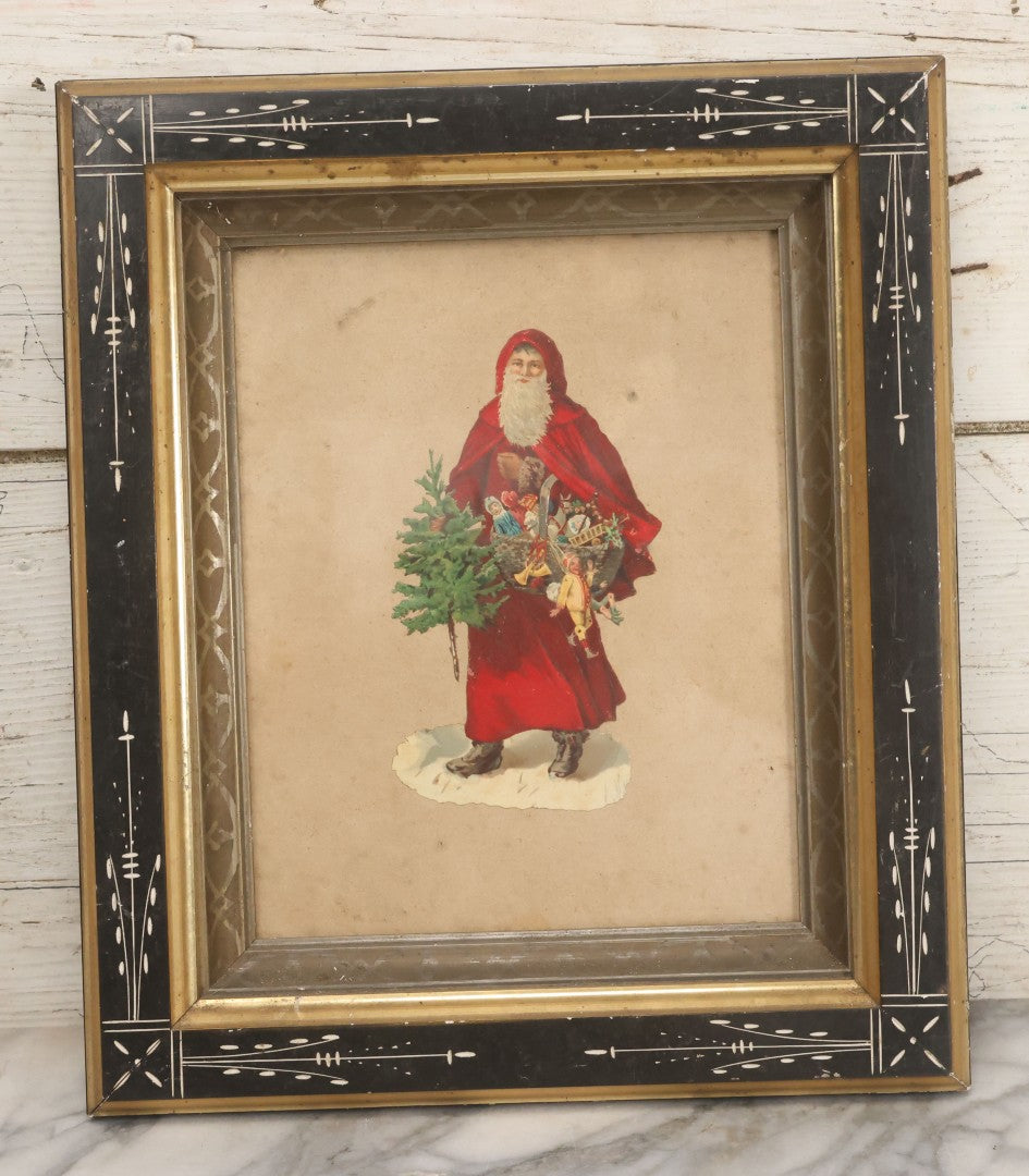 Lot 051 - Antique Victorian Scrapbook Page With Santa Claus Embossed Die Cut In Black Etched Eastlake Frame, 11-7/8" x 13-7/8"