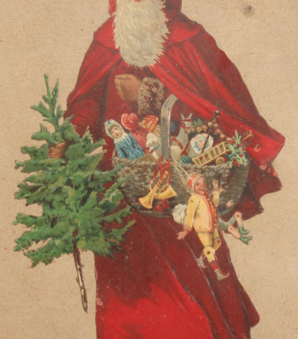 Lot 051 - Antique Victorian Scrapbook Page With Santa Claus Embossed Die Cut In Black Etched Eastlake Frame, 11-7/8" x 13-7/8"