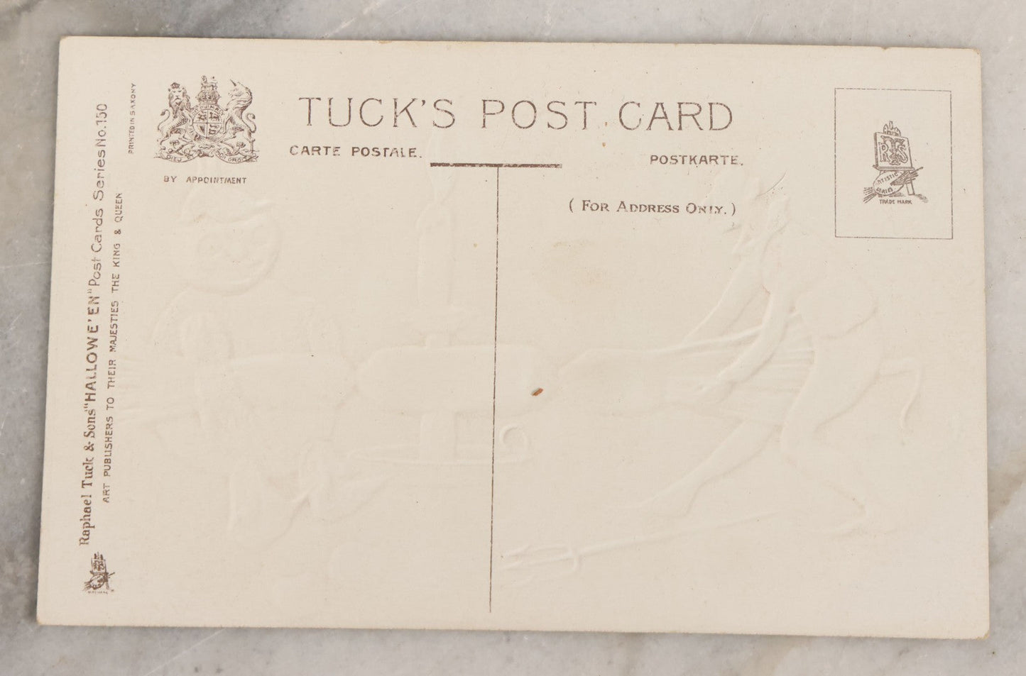 Lot 054 - Antique Embossed Halloween Postcard With Devil And Pumpkin Man Playing Tug-Of-War With Candy, Published By Raphael Tuck & Sons, Hallowe'En Post Cards Series No. 150, Printed In Saxony, Germany, Unused