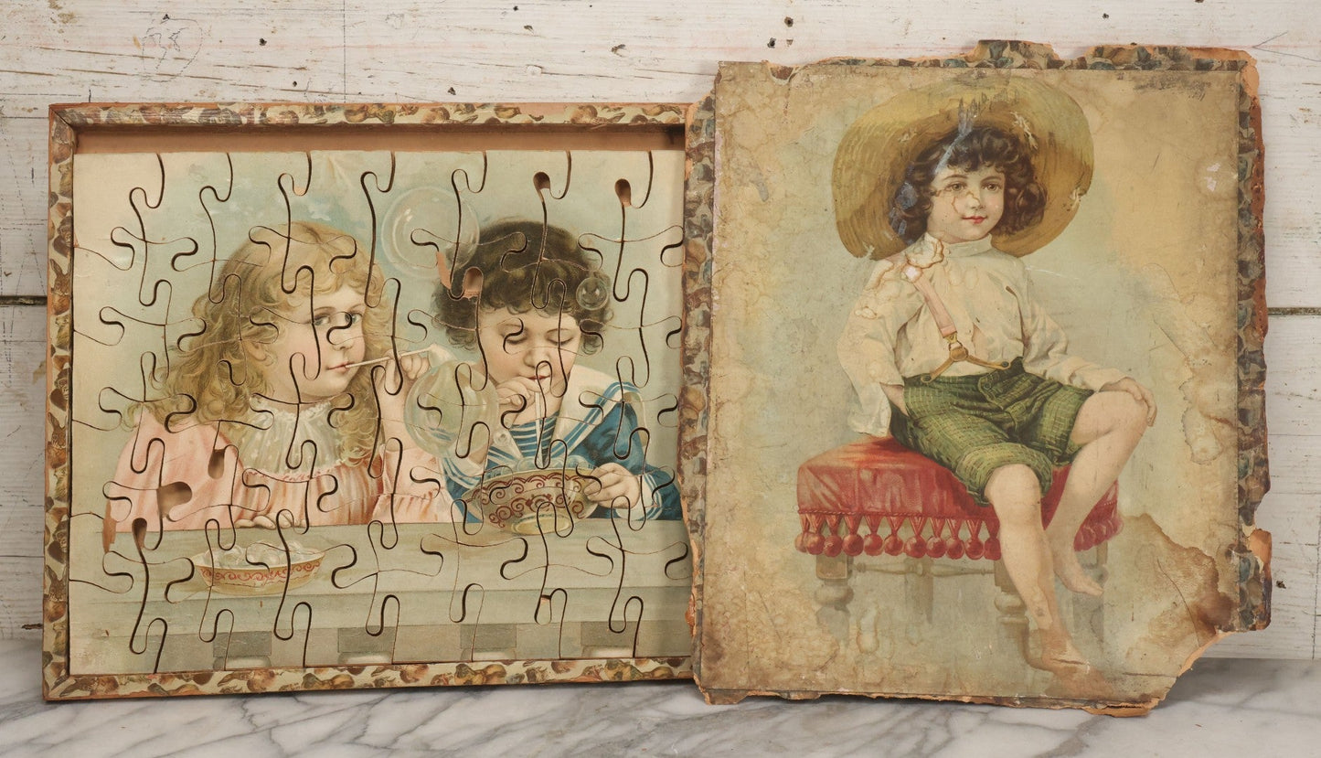 Lot 062 - Antique Double Sided Victorian Lithographed Wood Cut Jigsaw Puzzle With Scene Of Children In Costume With Clown And Children Blowing Bubbles, With Original Box And Partial Lithographed Lid