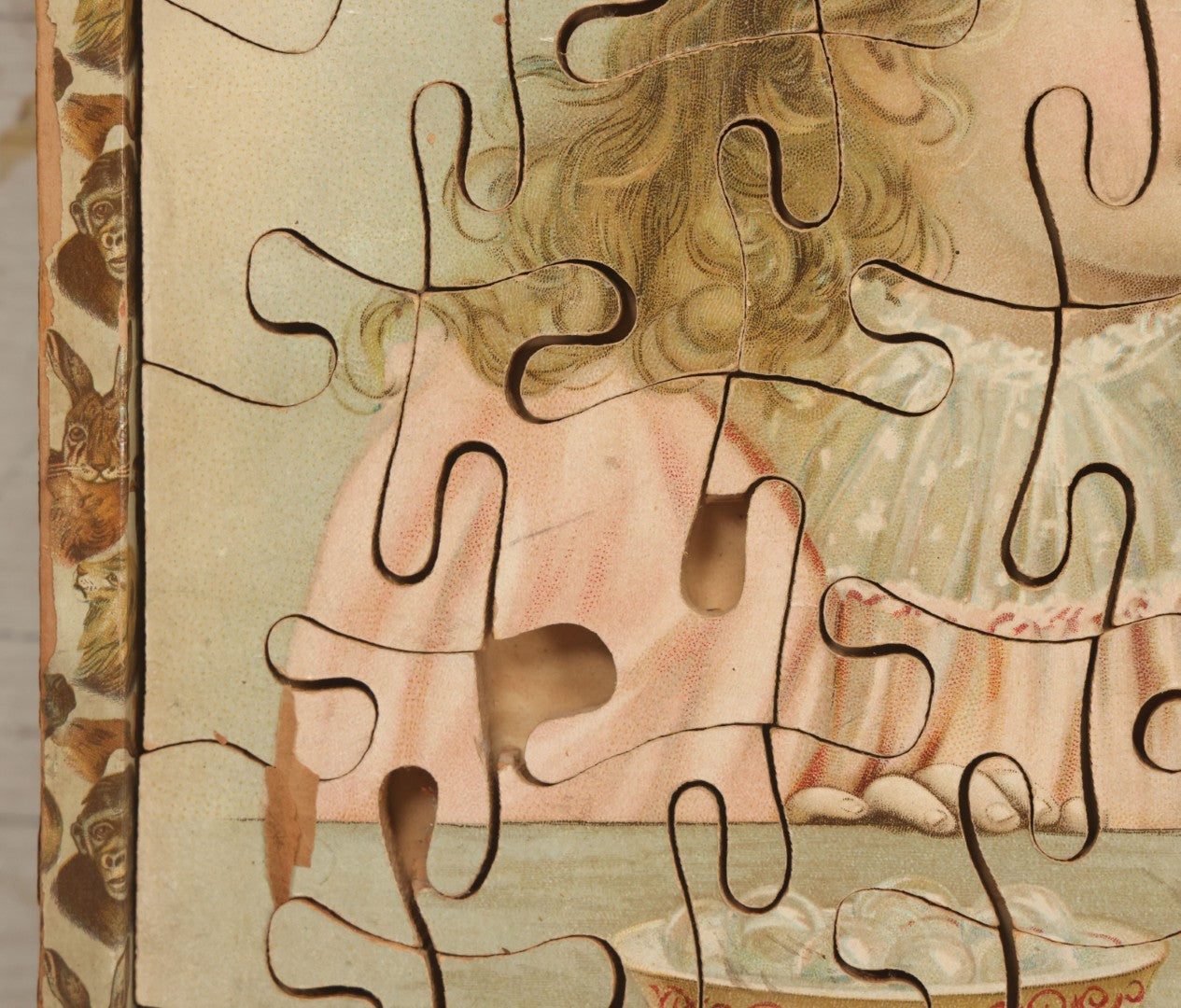 Lot 062 - Antique Double Sided Victorian Lithographed Wood Cut Jigsaw Puzzle With Scene Of Children In Costume With Clown And Children Blowing Bubbles, With Original Box And Partial Lithographed Lid