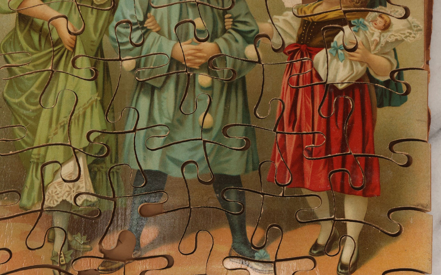 Lot 062 - Antique Double Sided Victorian Lithographed Wood Cut Jigsaw Puzzle With Scene Of Children In Costume With Clown And Children Blowing Bubbles, With Original Box And Partial Lithographed Lid