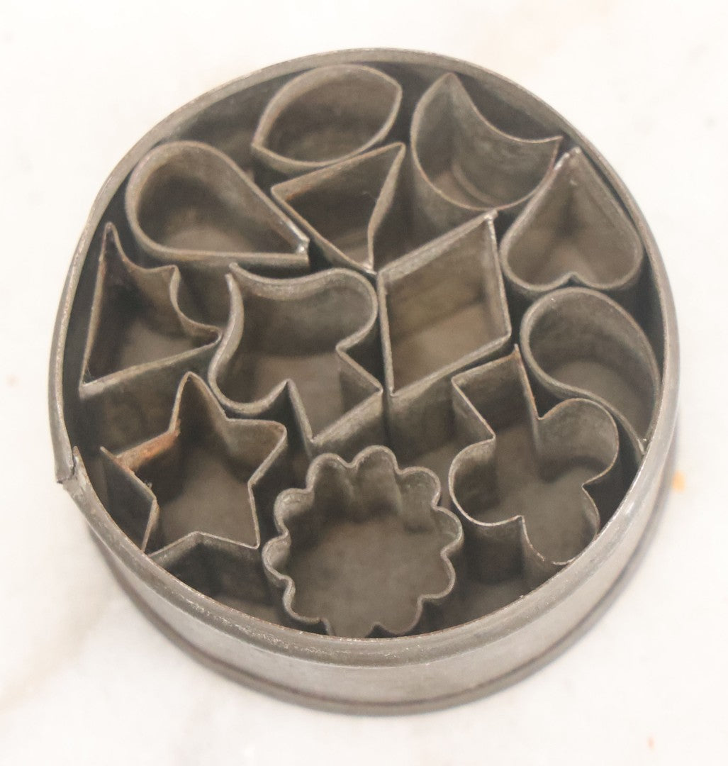 Lot 073 - Antique Miniature Cookie Cutters Set Of Twelve In Original Tin, Various Shapes Including Card Suites, Star, Etc., G.M.T. Co., Germany