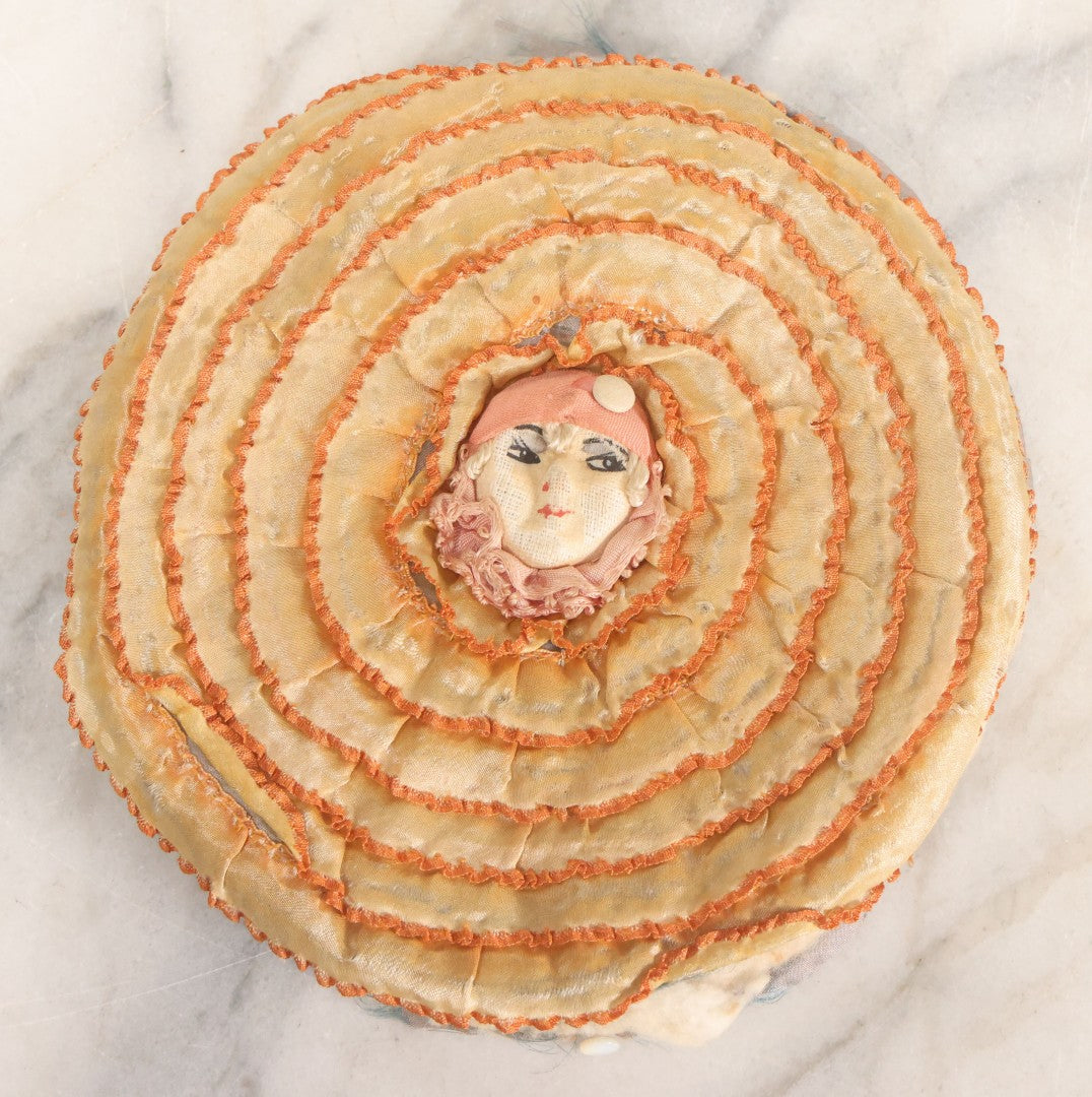 Lot 075 - Antique Novelty Sewing Pillow Pouch With Clown Flapper Girl, Silk Fabric, Circa 1920s, Note Worn, Poor Condition, 6-3/4" Diameter