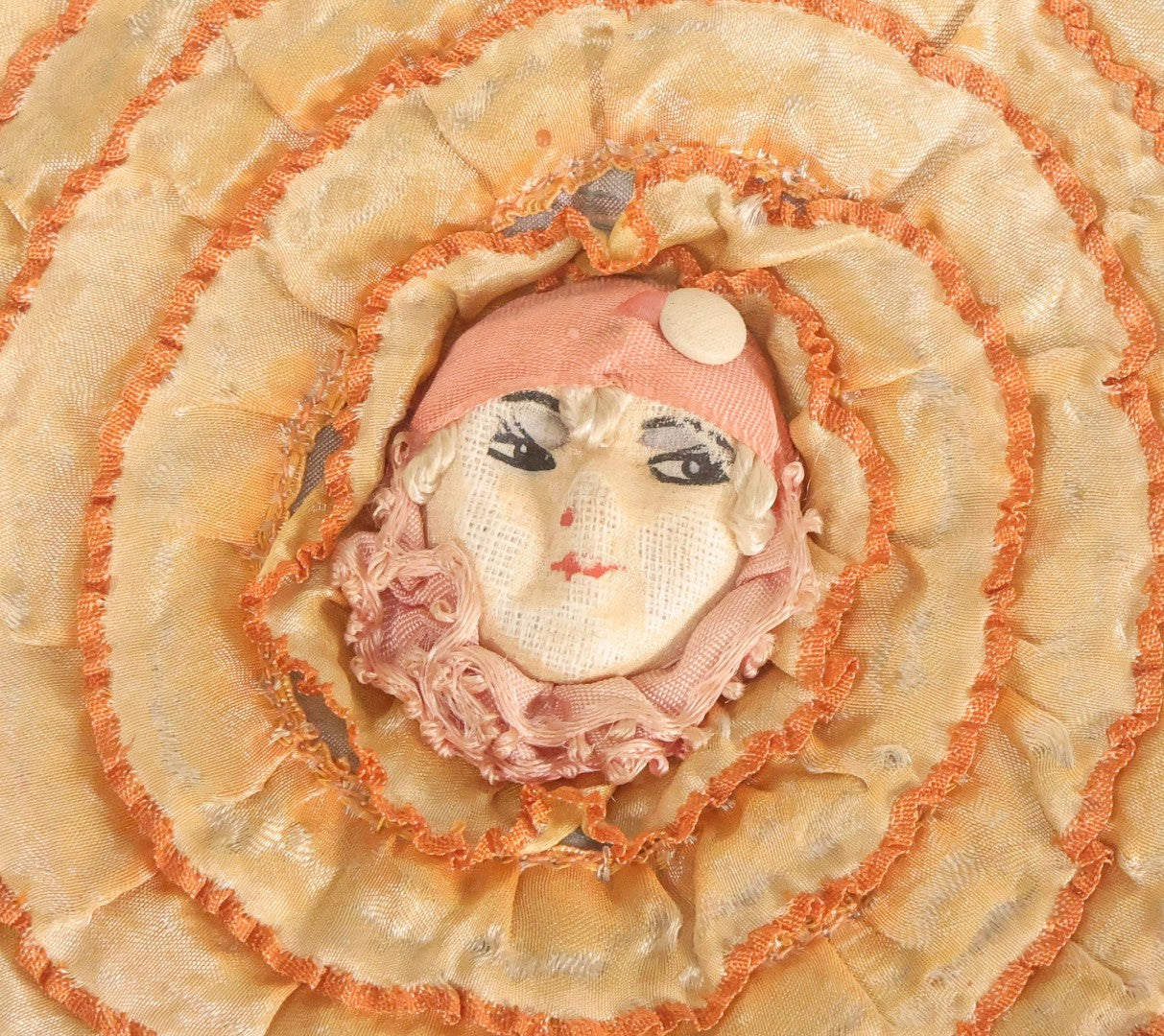 Lot 075 - Antique Novelty Sewing Pillow Pouch With Clown Flapper Girl, Silk Fabric, Circa 1920s, Note Worn, Poor Condition, 6-3/4" Diameter