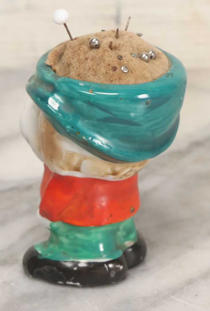 Lot 077 - Vintage Novelty Painted Porcelain Anthropomorphic Dog Caricature Pin Cushion, Made In Japan, With Several Ball Head Sewing Pins, 3-1/4" Height
