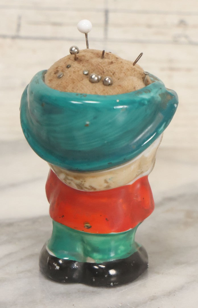 Lot 077 - Vintage Novelty Painted Porcelain Anthropomorphic Dog Caricature Pin Cushion, Made In Japan, With Several Ball Head Sewing Pins, 3-1/4" Height