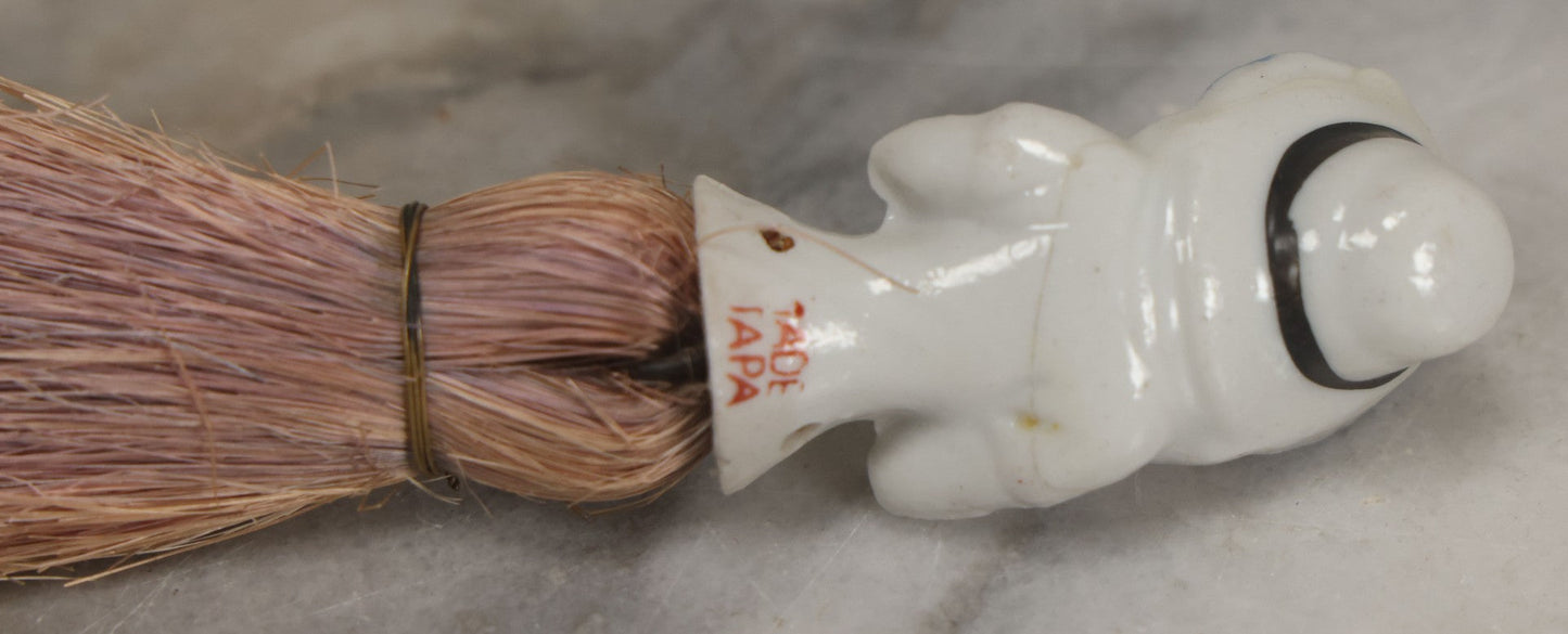 Lot 078 - Vintage Porcelain Lady With Blue Hat, Green Bow, Straw Dresser Brush, Made In Japan, Note Crack, Repair, 5-1/2" Length