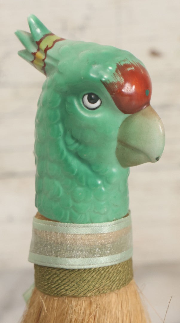 Lot 079 - Vintage Green Painted Porcelain Parrot Head Straw Dresser Brush With Green Ribbon, Made In Japan, 7-1/2" Length