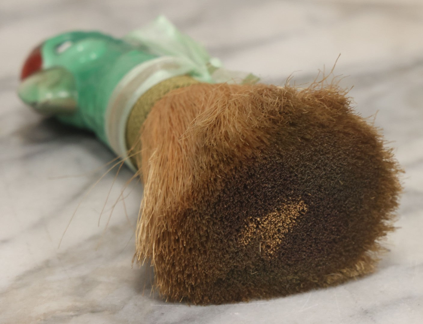 Lot 079 - Vintage Green Painted Porcelain Parrot Head Straw Dresser Brush With Green Ribbon, Made In Japan, 7-1/2" Length