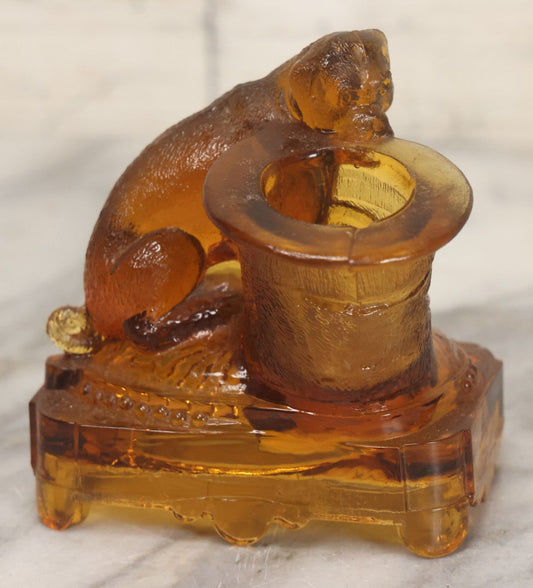 Lot 084 - Antique Molded Orange Glass Toothpick Holder With Sa Dog Resting Chin On Top Hat, Note Chips To Interior Of Hat