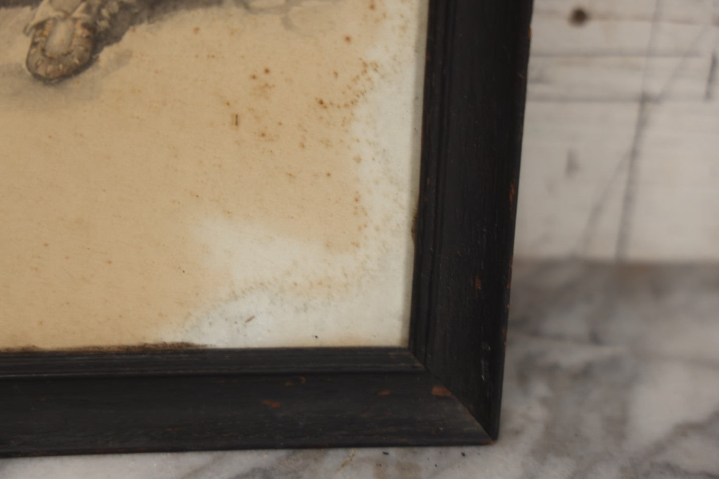 Lot 004 - Antique Watercolor Painting Of Native American Woman Holding A Staff Standing By Canoe In Black Painted Wood Frame, 10-1/2" x 20"