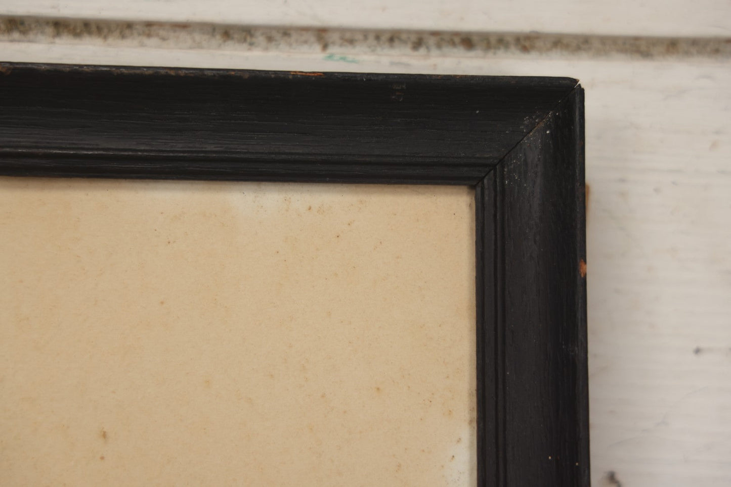 Lot 004 - Antique Watercolor Painting Of Native American Woman Holding A Staff Standing By Canoe In Black Painted Wood Frame, 10-1/2" x 20"