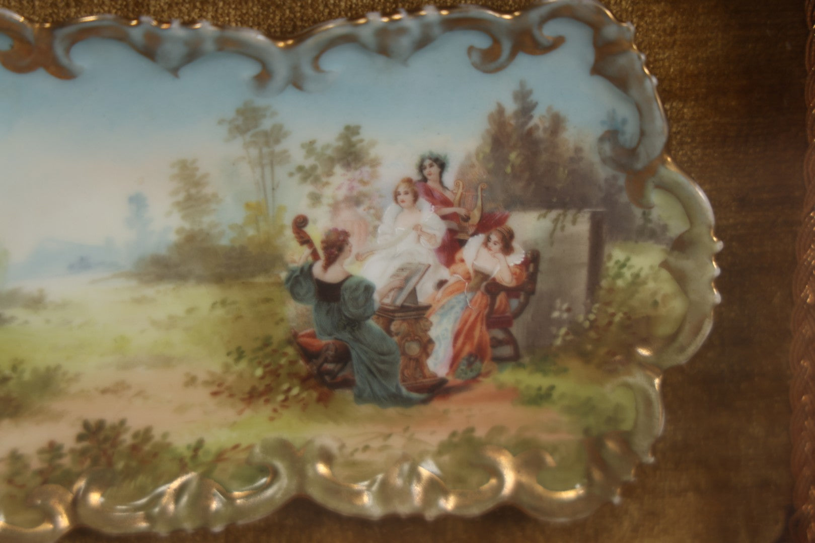 Lot 005 - Antique Hand Painted Dish With Elegant Women Playing Music Outdoors In Shadow Box Frame, 8-3/8" x 6-3/8"
