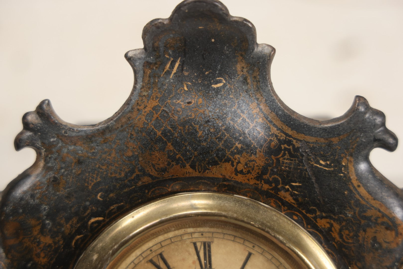 Lot 006 - Antique Metal And Wood Mantel Clock With Hand Painted Details, Paper Clock Face, And Domed Pendulum Window, With Paper Label Inside, Manufactured By The Waterbury Clock Co., Waterbury, Connecticut, Untested, No Pendulum, 13-1/8" H