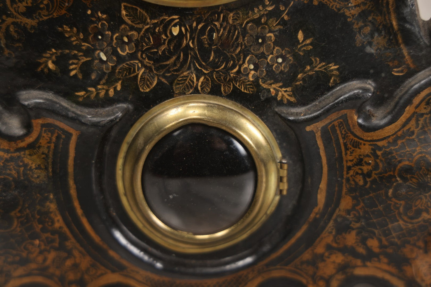 Lot 006 - Antique Metal And Wood Mantel Clock With Hand Painted Details, Paper Clock Face, And Domed Pendulum Window, With Paper Label Inside, Manufactured By The Waterbury Clock Co., Waterbury, Connecticut, Untested, No Pendulum, 13-1/8" H