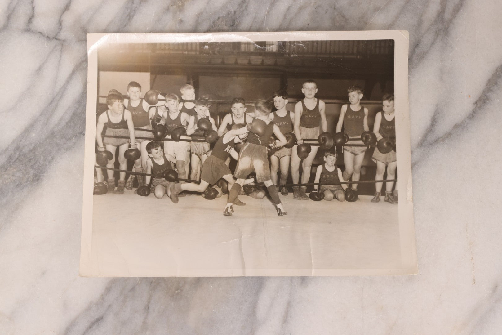 Lot 104 - Grouping Of Four Vintage Glossy Boxing Related Photographs Including A Brawl Of Young Boys, A Match Between Two Young Boys In Navy Tank Tops, Boxing Promo Photos Of Joe Baksi And Melio Bettina