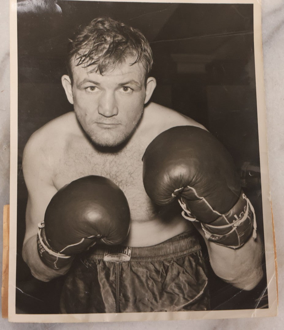 Lot 104 - Grouping Of Four Vintage Glossy Boxing Related Photographs Including A Brawl Of Young Boys, A Match Between Two Young Boys In Navy Tank Tops, Boxing Promo Photos Of Joe Baksi And Melio Bettina