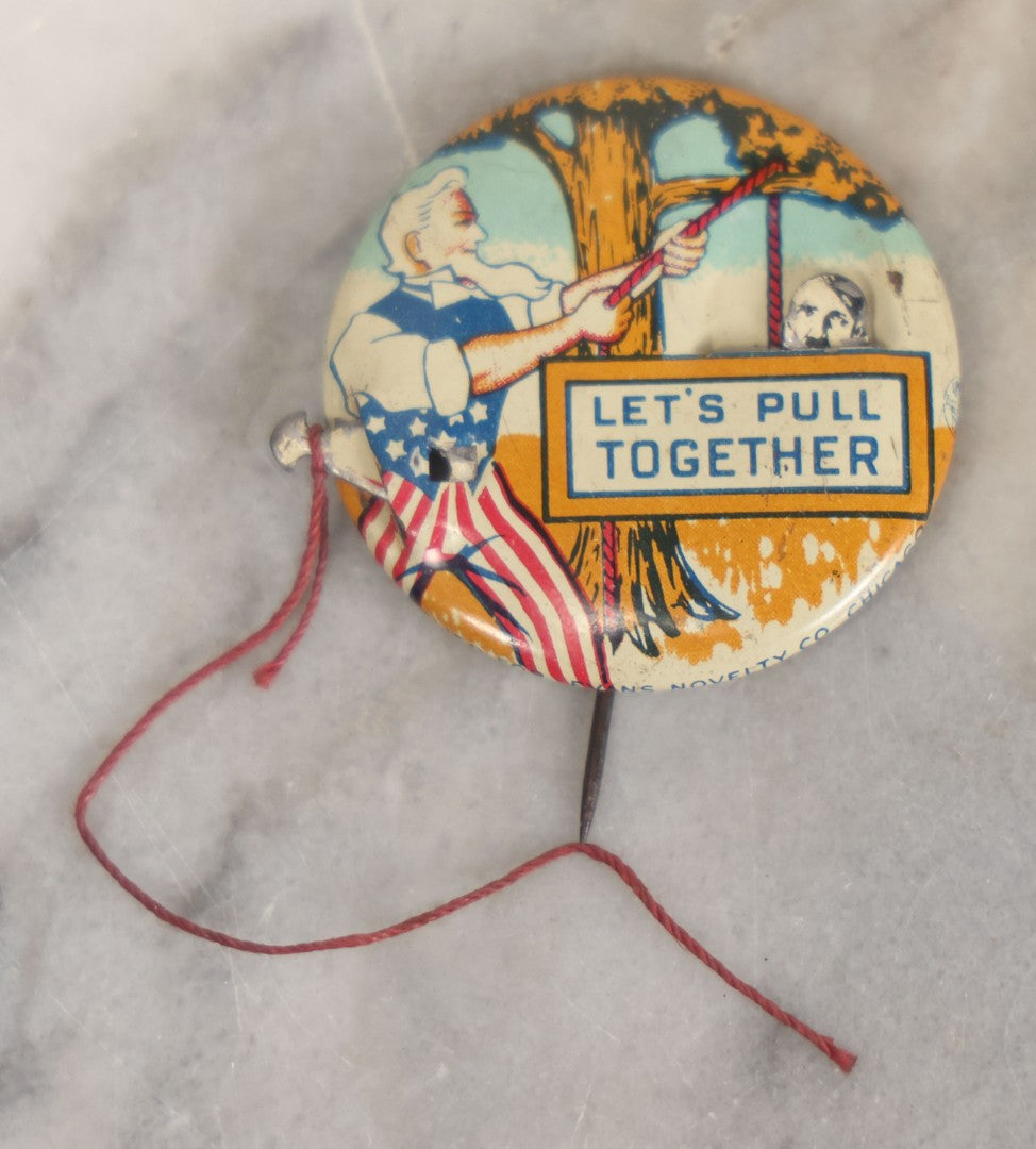 Lot 008 - Pair Of Vintage World War 2 Era Anti Hitler Pinback Buttons Including Animated Button Of Uncle Sam Hanging Hitler "Let's Pull Together," And "To Hell With Hitler" Blue Button