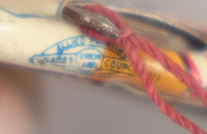 Lot 008 - Pair Of Vintage World War 2 Era Anti Hitler Pinback Buttons Including Animated Button Of Uncle Sam Hanging Hitler "Let's Pull Together," And "To Hell With Hitler" Blue Button