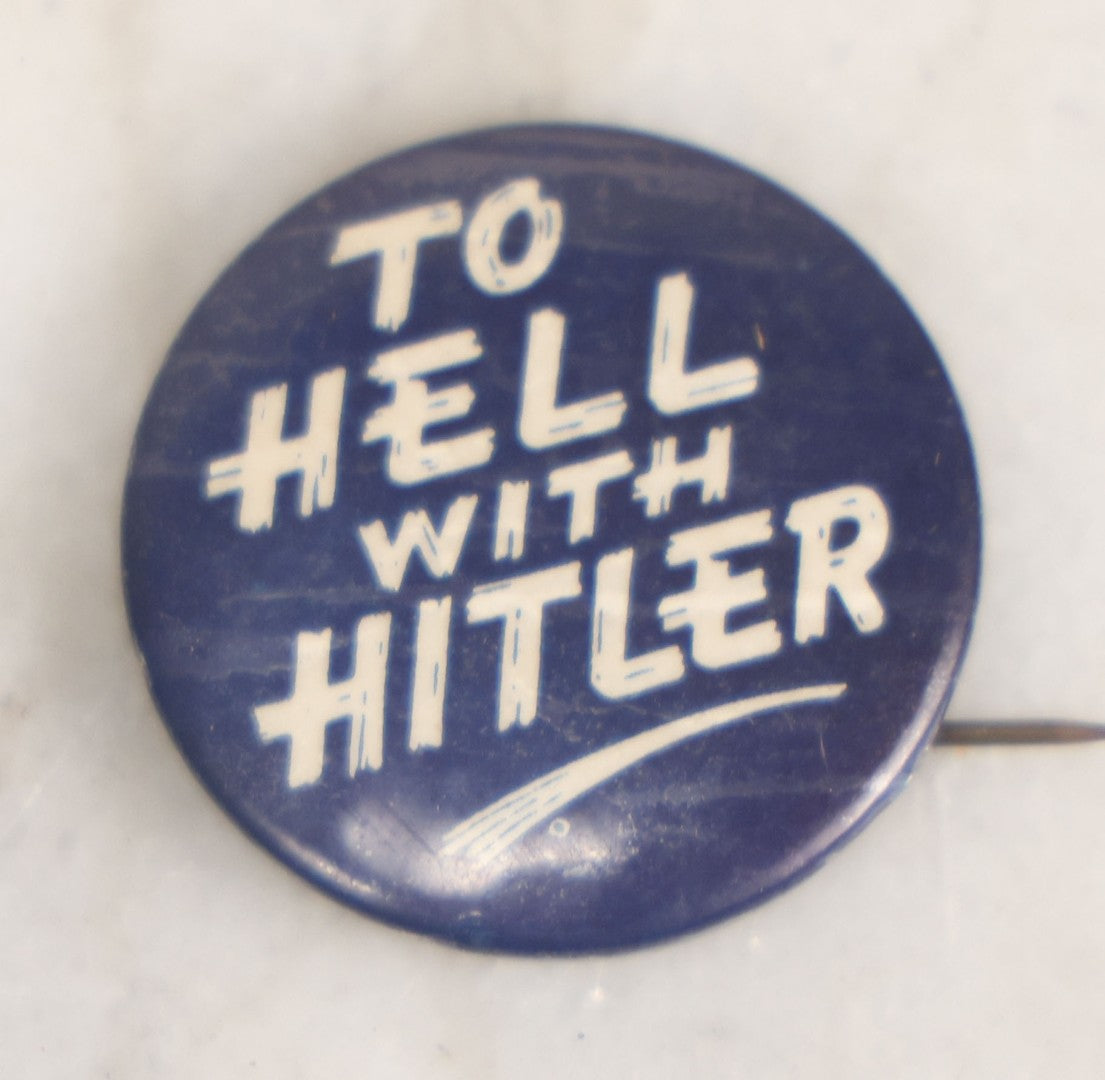 Lot 008 - Pair Of Vintage World War 2 Era Anti Hitler Pinback Buttons Including Animated Button Of Uncle Sam Hanging Hitler "Let's Pull Together," And "To Hell With Hitler" Blue Button