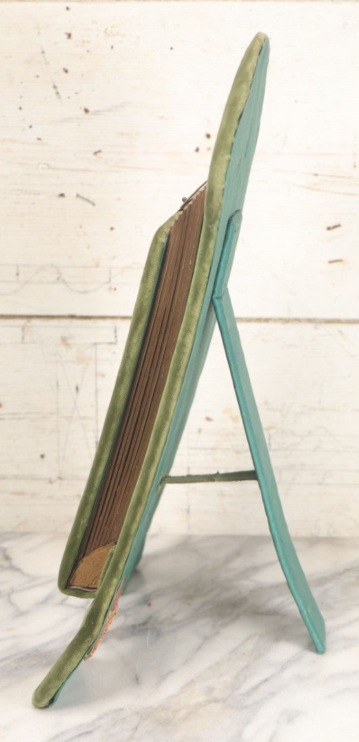 Lot 010 - Antique Victorian Green Velvet Display Photo Album With Stand And Tilt Down Cover, Brass Adornments, Containing 12 Cabinet Card And 24 C.D.V. Photographs And Images, Including Man Posing With Rifle, Sailor In Uniform, And Men Smoking