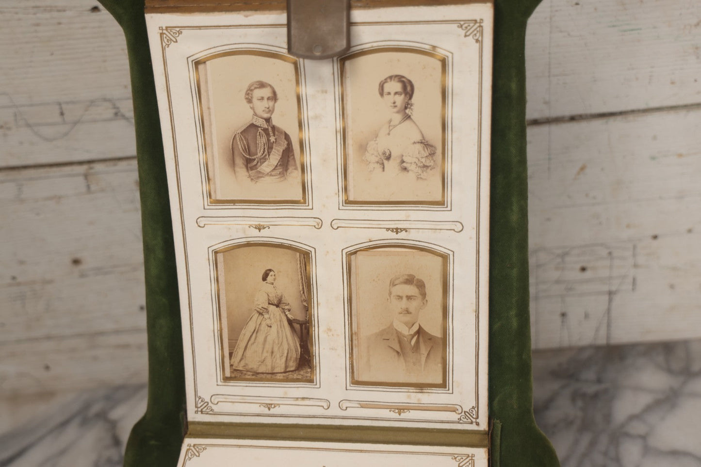 Lot 010 - Antique Victorian Green Velvet Display Photo Album With Stand And Tilt Down Cover, Brass Adornments, Containing 12 Cabinet Card And 24 C.D.V. Photographs And Images, Including Man Posing With Rifle, Sailor In Uniform, And Men Smoking