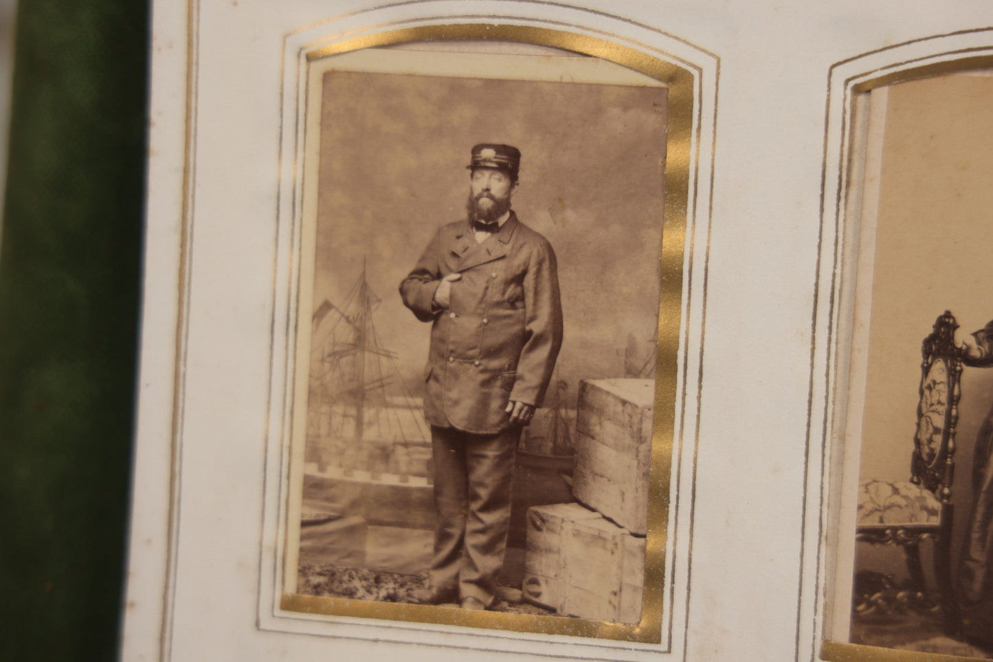 Lot 010 - Antique Victorian Green Velvet Display Photo Album With Stand And Tilt Down Cover, Brass Adornments, Containing 12 Cabinet Card And 24 C.D.V. Photographs And Images, Including Man Posing With Rifle, Sailor In Uniform, And Men Smoking