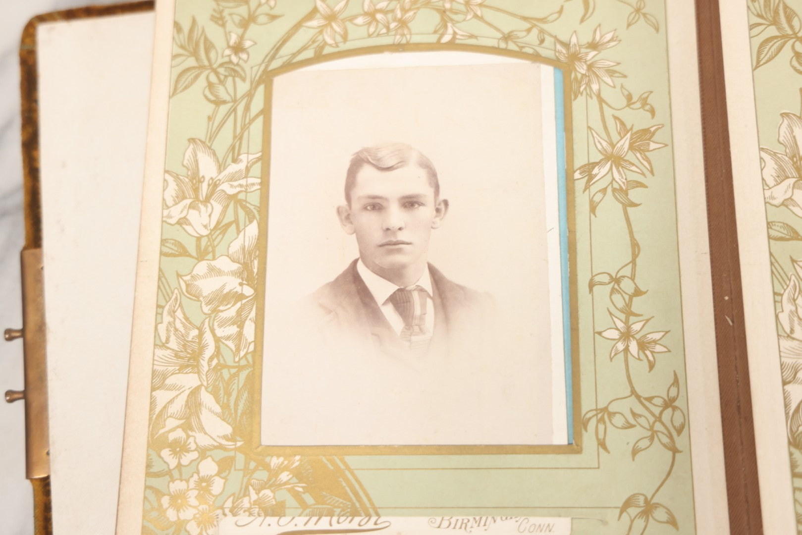 Lot 011 - Antique Victorian Photo Album With Yellow Velvet Cover, Celluloid Shell Decoration With Crab, Containing 28 Cabinet Card And Twelve C.D.V. Photographs, Including Co-Ed Class Photo, Little Girl Holding Bisque Doll, Note Binding Completely Shot