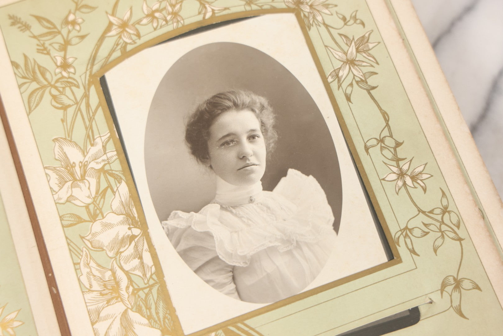 Lot 011 - Antique Victorian Photo Album With Yellow Velvet Cover, Celluloid Shell Decoration With Crab, Containing 28 Cabinet Card And Twelve C.D.V. Photographs, Including Co-Ed Class Photo, Little Girl Holding Bisque Doll, Note Binding Completely Shot