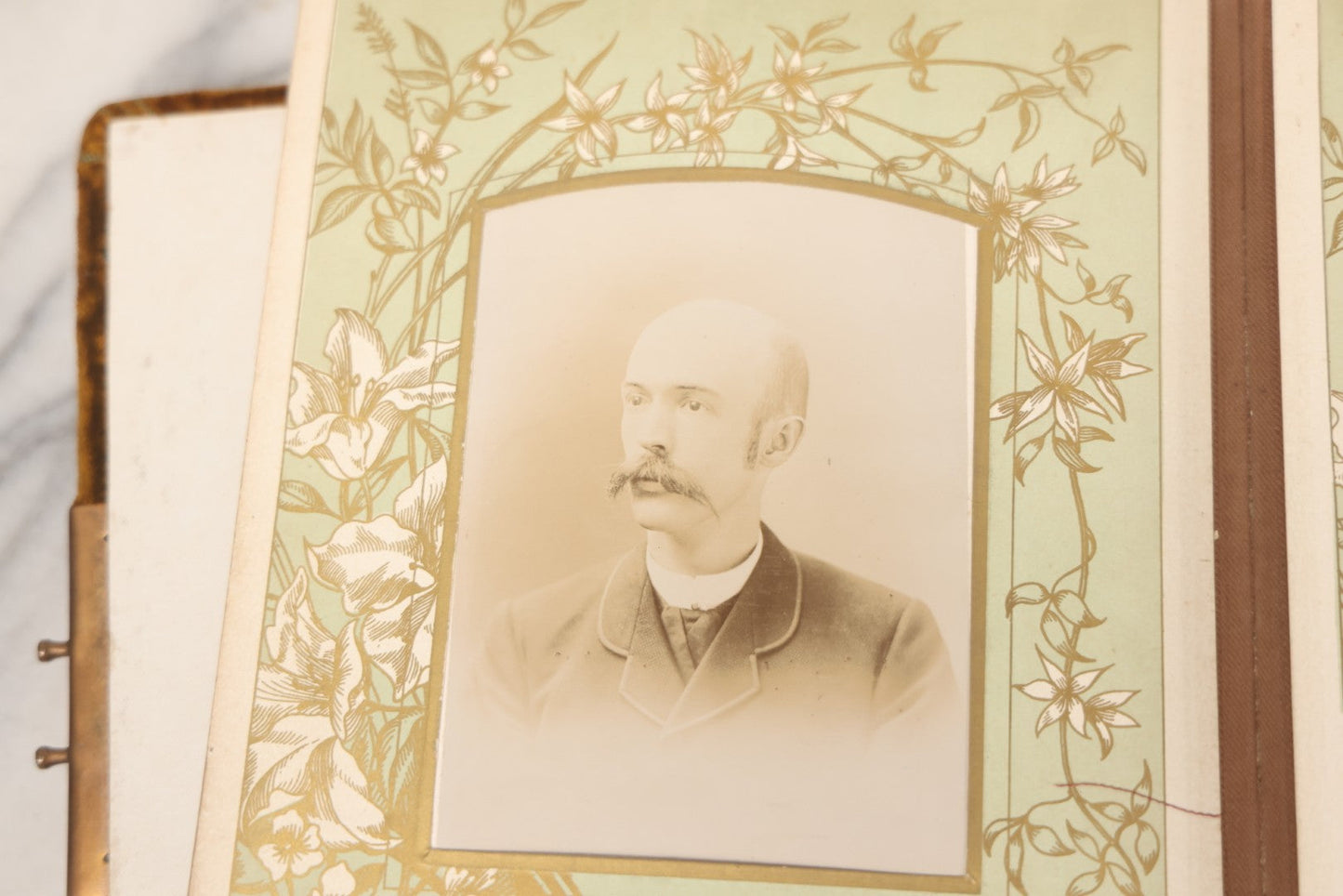 Lot 011 - Antique Victorian Photo Album With Yellow Velvet Cover, Celluloid Shell Decoration With Crab, Containing 28 Cabinet Card And Twelve C.D.V. Photographs, Including Co-Ed Class Photo, Little Girl Holding Bisque Doll, Note Binding Completely Shot