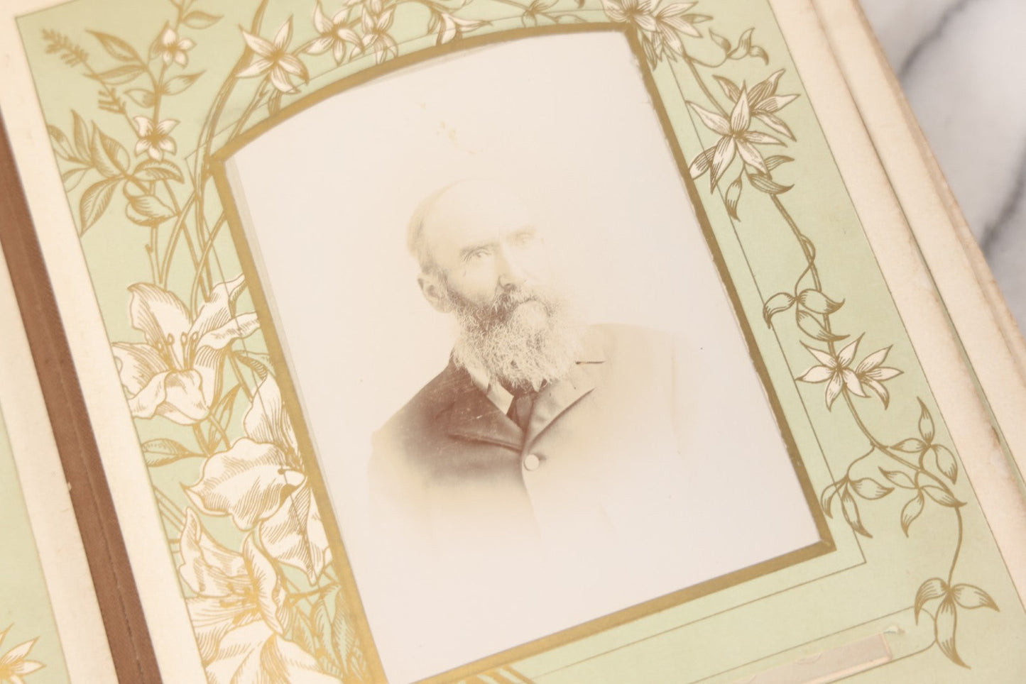 Lot 011 - Antique Victorian Photo Album With Yellow Velvet Cover, Celluloid Shell Decoration With Crab, Containing 28 Cabinet Card And Twelve C.D.V. Photographs, Including Co-Ed Class Photo, Little Girl Holding Bisque Doll, Note Binding Completely Shot