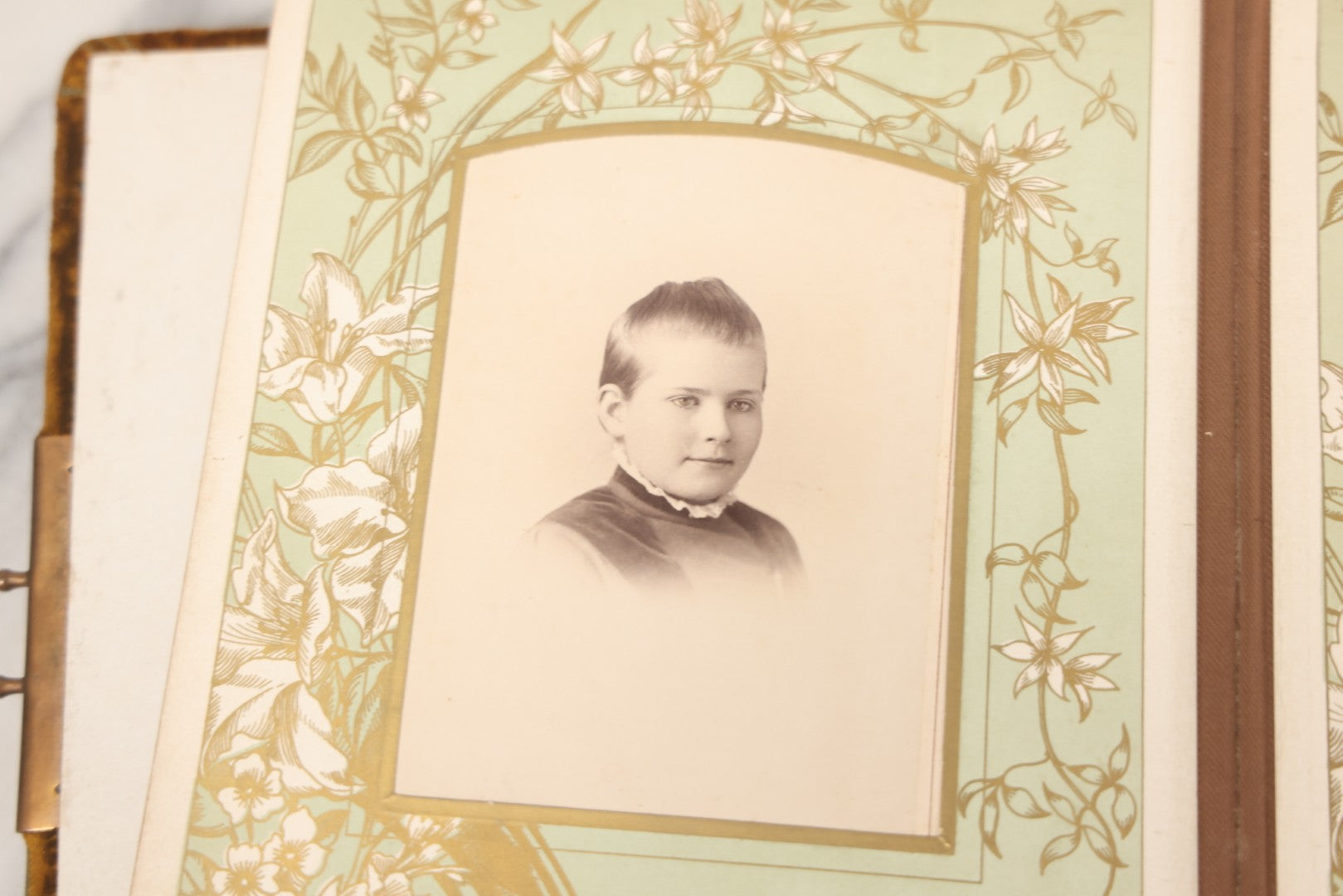 Lot 011 - Antique Victorian Photo Album With Yellow Velvet Cover, Celluloid Shell Decoration With Crab, Containing 28 Cabinet Card And Twelve C.D.V. Photographs, Including Co-Ed Class Photo, Little Girl Holding Bisque Doll, Note Binding Completely Shot