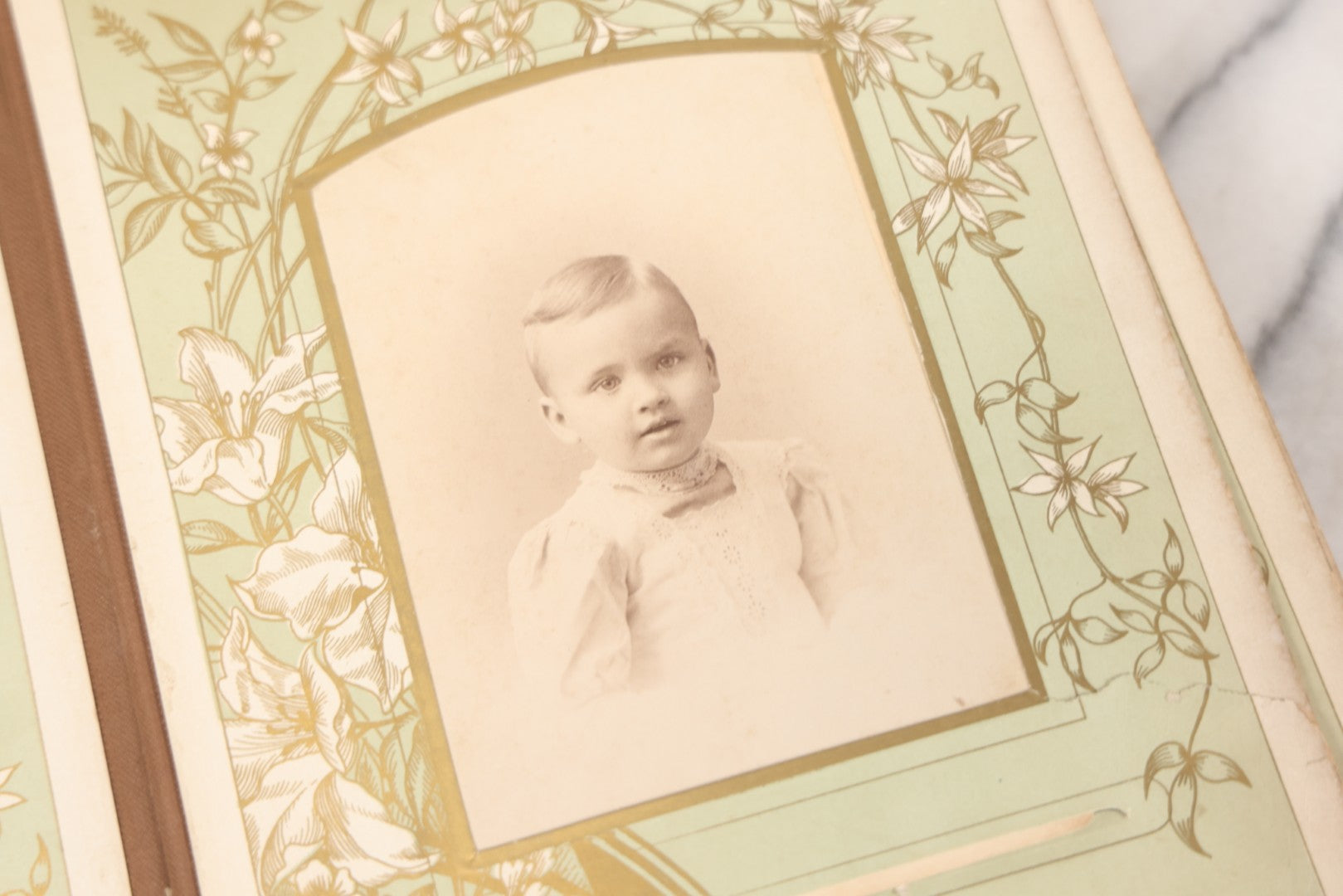 Lot 011 - Antique Victorian Photo Album With Yellow Velvet Cover, Celluloid Shell Decoration With Crab, Containing 28 Cabinet Card And Twelve C.D.V. Photographs, Including Co-Ed Class Photo, Little Girl Holding Bisque Doll, Note Binding Completely Shot