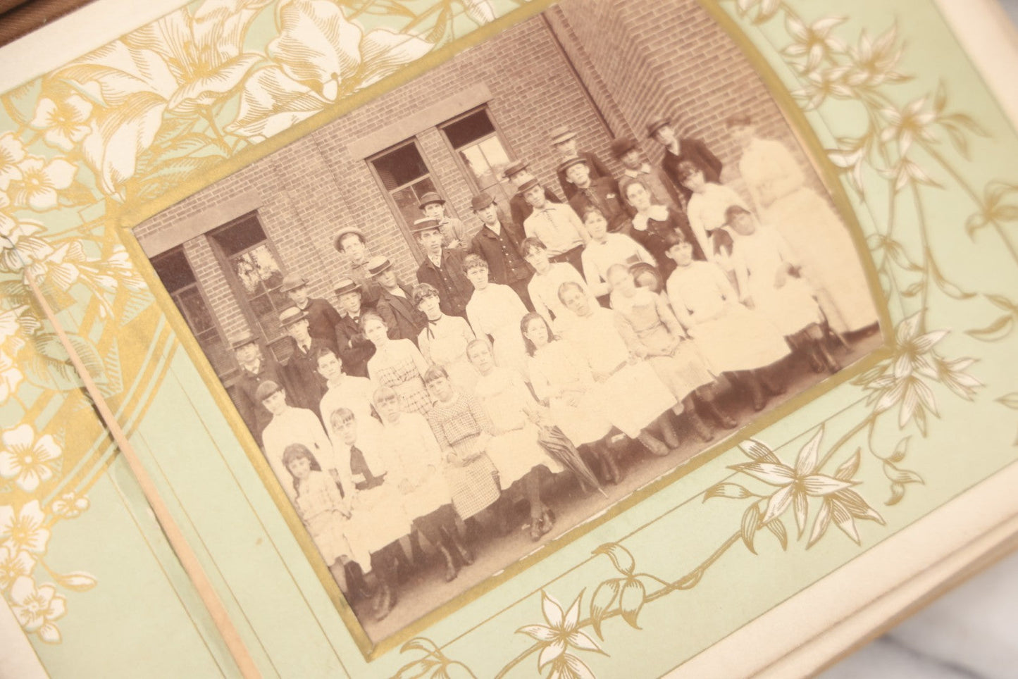 Lot 011 - Antique Victorian Photo Album With Yellow Velvet Cover, Celluloid Shell Decoration With Crab, Containing 28 Cabinet Card And Twelve C.D.V. Photographs, Including Co-Ed Class Photo, Little Girl Holding Bisque Doll, Note Binding Completely Shot