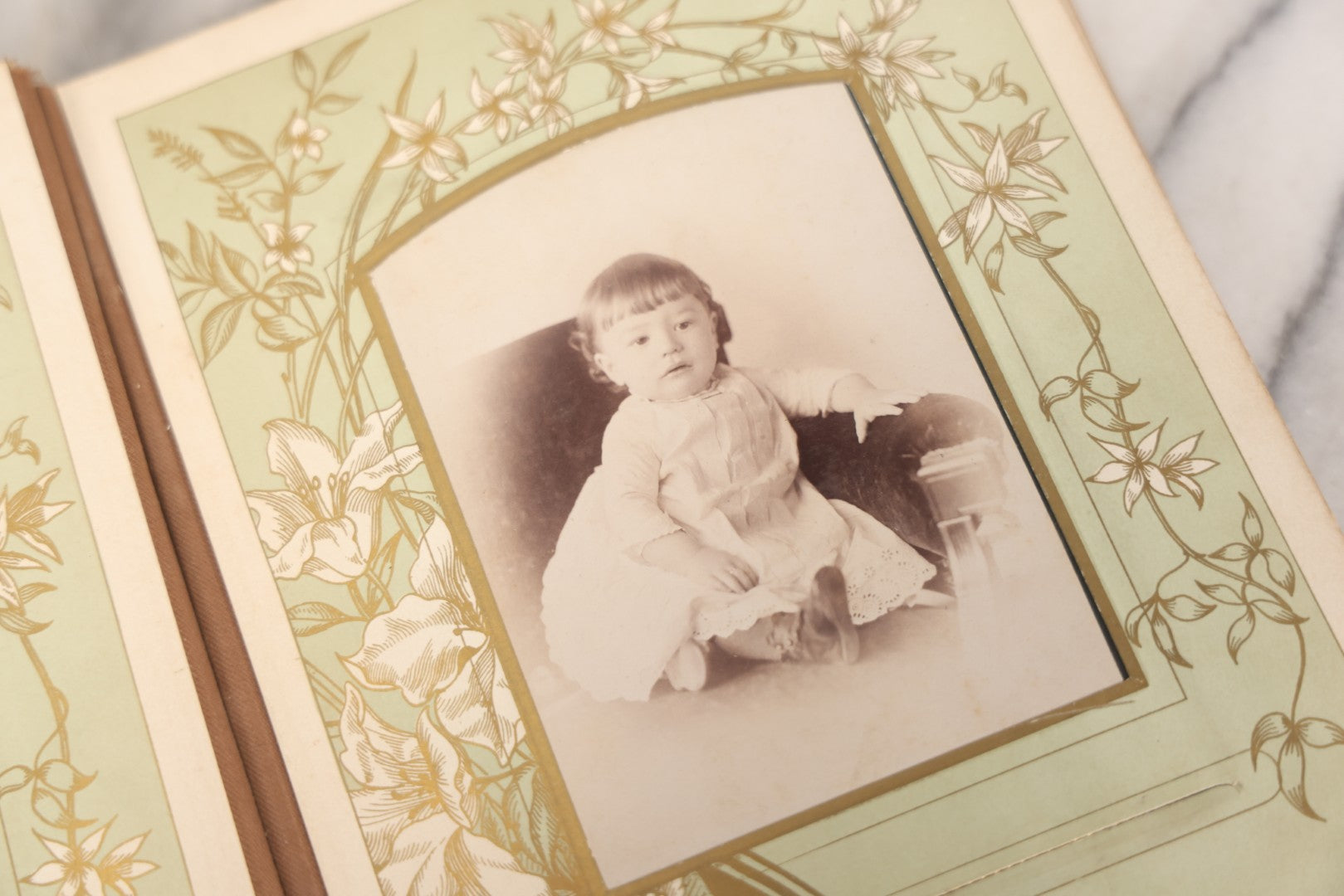 Lot 011 - Antique Victorian Photo Album With Yellow Velvet Cover, Celluloid Shell Decoration With Crab, Containing 28 Cabinet Card And Twelve C.D.V. Photographs, Including Co-Ed Class Photo, Little Girl Holding Bisque Doll, Note Binding Completely Shot