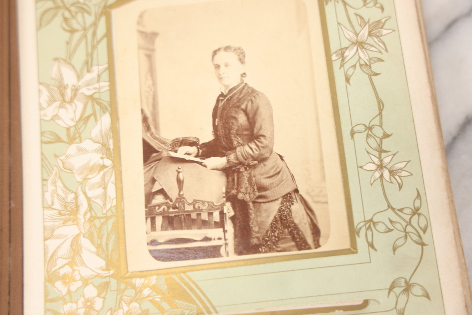 Lot 011 - Antique Victorian Photo Album With Yellow Velvet Cover, Celluloid Shell Decoration With Crab, Containing 28 Cabinet Card And Twelve C.D.V. Photographs, Including Co-Ed Class Photo, Little Girl Holding Bisque Doll, Note Binding Completely Shot