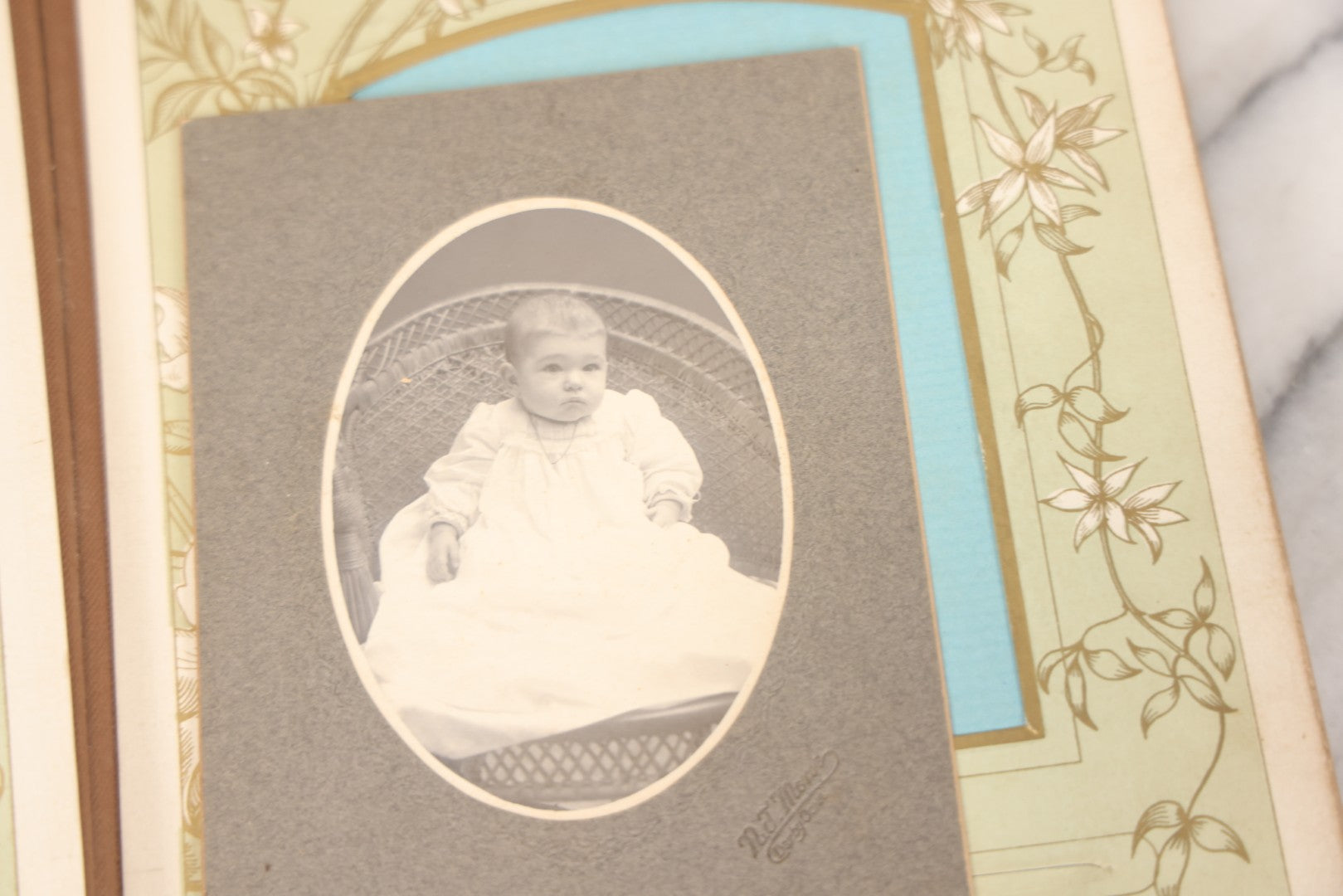 Lot 011 - Antique Victorian Photo Album With Yellow Velvet Cover, Celluloid Shell Decoration With Crab, Containing 28 Cabinet Card And Twelve C.D.V. Photographs, Including Co-Ed Class Photo, Little Girl Holding Bisque Doll, Note Binding Completely Shot