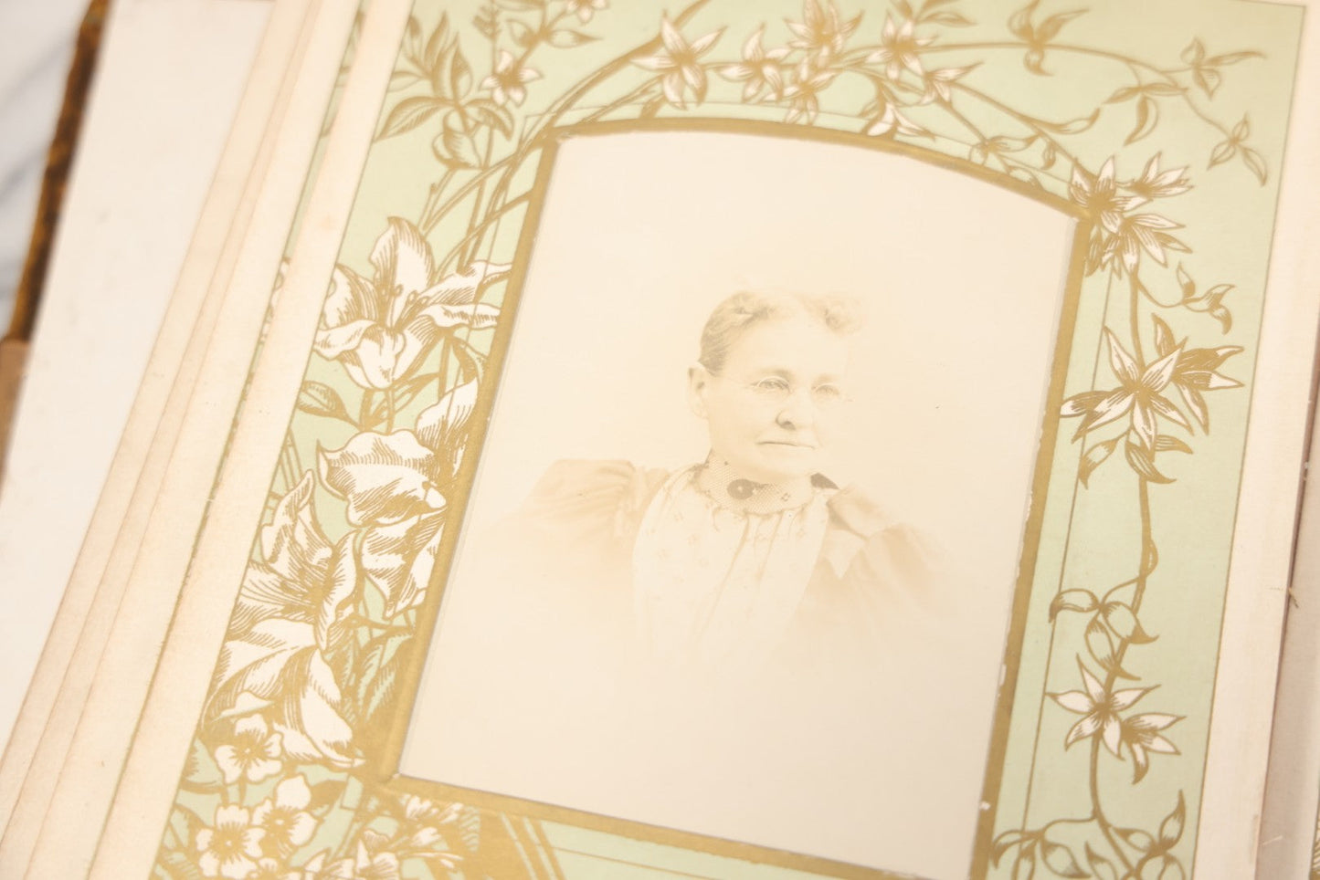 Lot 011 - Antique Victorian Photo Album With Yellow Velvet Cover, Celluloid Shell Decoration With Crab, Containing 28 Cabinet Card And Twelve C.D.V. Photographs, Including Co-Ed Class Photo, Little Girl Holding Bisque Doll, Note Binding Completely Shot