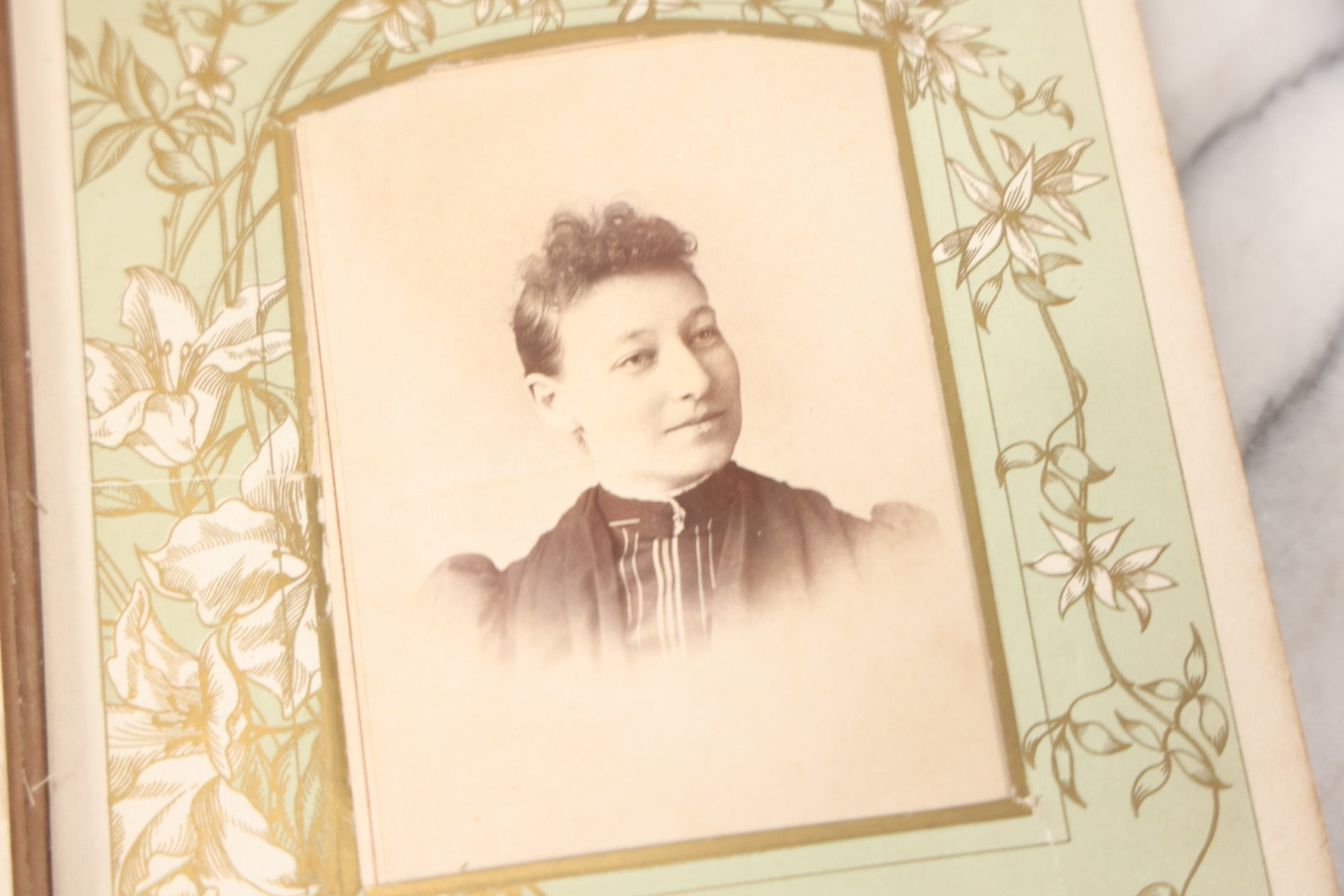 Lot 011 - Antique Victorian Photo Album With Yellow Velvet Cover, Celluloid Shell Decoration With Crab, Containing 28 Cabinet Card And Twelve C.D.V. Photographs, Including Co-Ed Class Photo, Little Girl Holding Bisque Doll, Note Binding Completely Shot